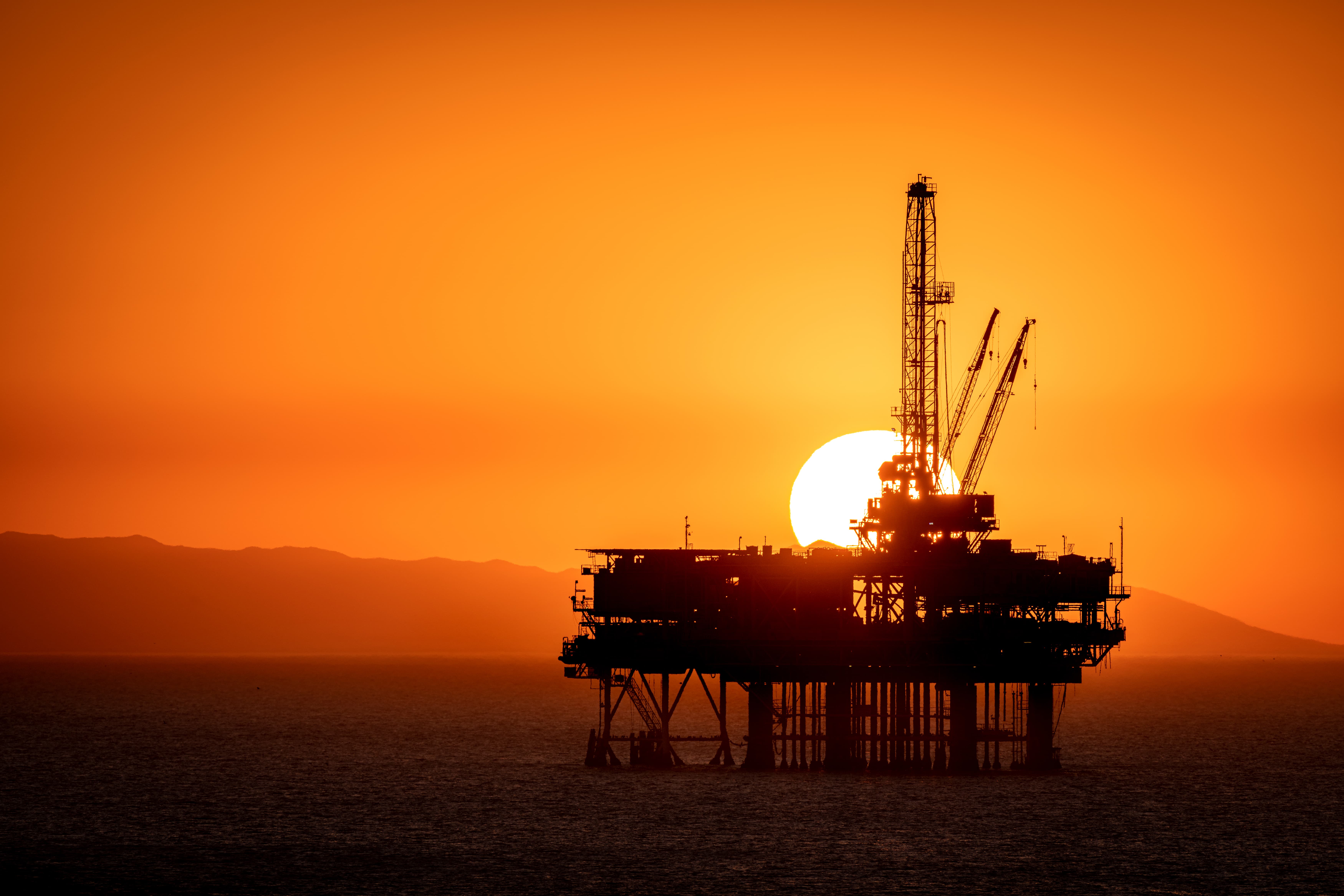  offshore oil platform at dusk